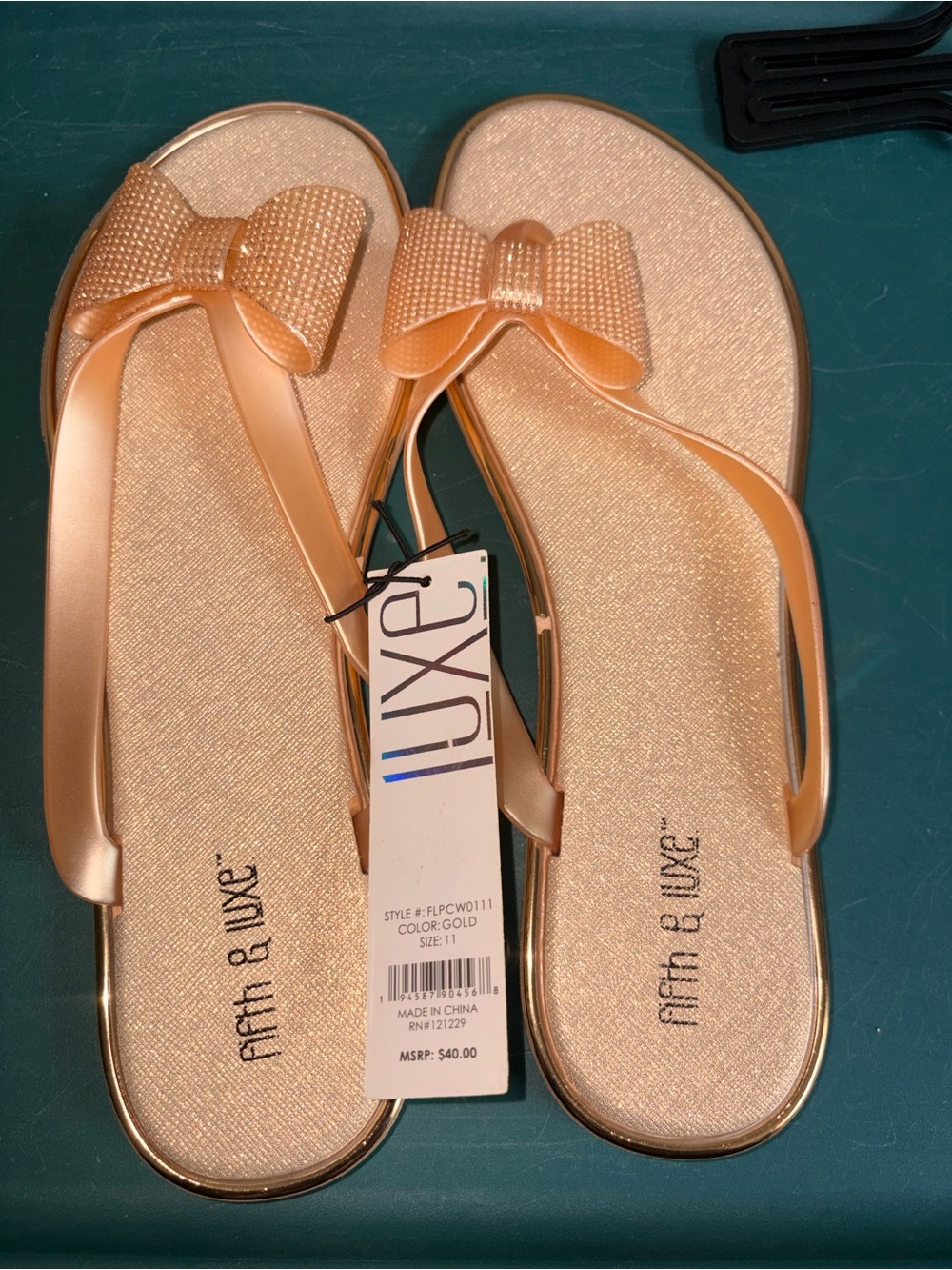 Women's Gold Bow Flip Flops